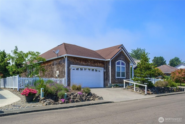 2603 Sea Crest Ln, Long Beach, WA 98631 - view of front of home with a garage, driveway, and roof with shingles