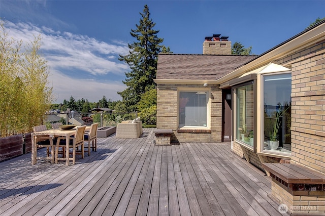 3006 43rd Ave W, Seattle, WA 98199 - wooden terrace with outdoor dining area
