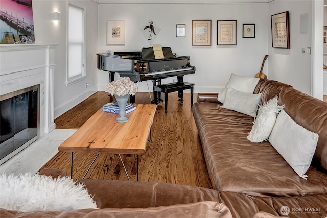3006 43rd Ave W, Seattle, WA 98199 - living room with baseboards and a fireplace with flush hearth