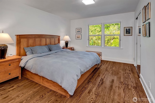 3006 43rd Ave W, Seattle, WA 98199 - bedroom featuring wood finished floors and baseboards
