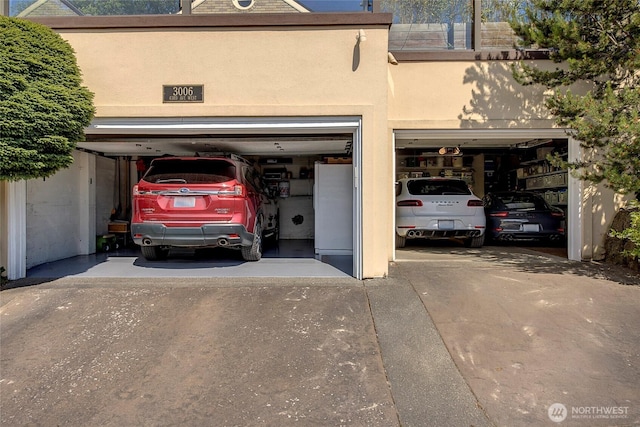 3006 43rd Ave W, Seattle, WA 98199 - garage with concrete driveway