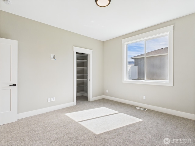 884 NE Tyler Pl E, Wenatchee, WA 98802 - unfurnished bedroom with carpet and a spacious closet