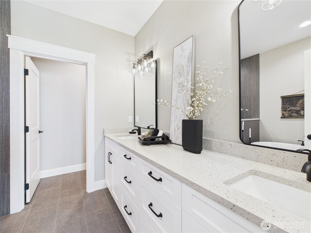 884 NE Tyler Pl E, Wenatchee, WA 98802 - bathroom with double vanity and tile patterned floors