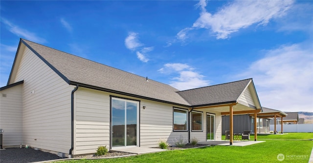 884 NE Tyler Pl E, Wenatchee, WA 98802 - rear view of property featuring a patio area and a shingled roof