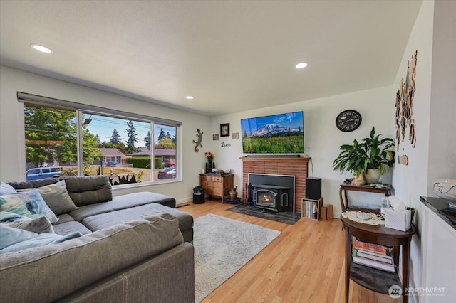 701 Mountain View Dr, Mount Vernon, WA 98273 - living area with a wood stove, light wood-style floors, and recessed lighting