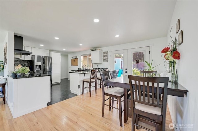 701 Mountain View Dr, Mount Vernon, WA 98273 - dining room with french doors, wood finished floors, and recessed lighting