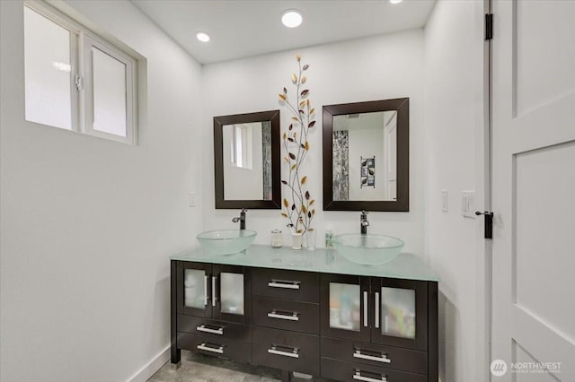 701 Mountain View Dr, Mount Vernon, WA 98273 - bathroom featuring double vanity and baseboards