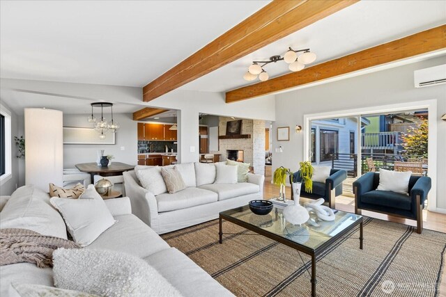 8733 21st Ave NW, Seattle, WA 98117 - living area featuring a wall mounted air conditioner, wood finished floors, and beam ceiling