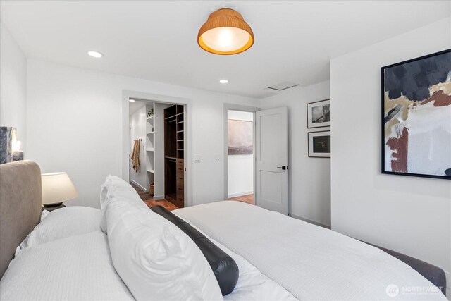 8733 21st Ave NW, Seattle, WA 98117 - bedroom with a spacious closet and recessed lighting