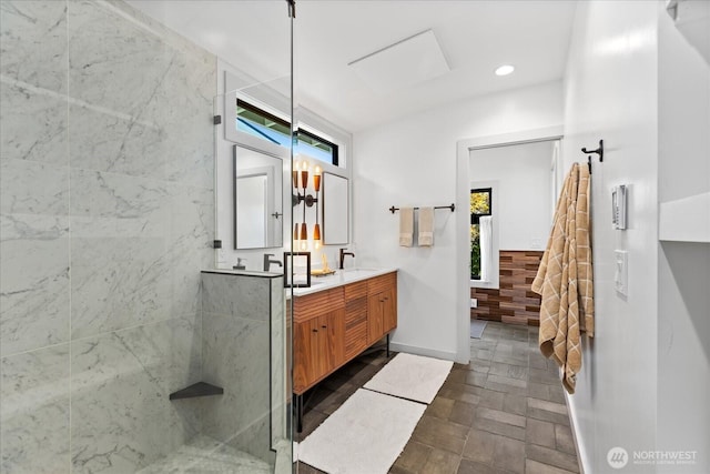 8733 21st Ave NW, Seattle, WA 98117 - bathroom with double vanity, a stall shower, and recessed lighting