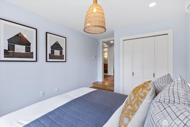 8733 21st Ave NW, Seattle, WA 98117 - bedroom with recessed lighting, a closet, and a wall unit AC