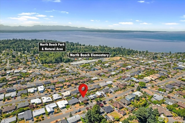8733 21st Ave NW, Seattle, WA 98117 - aerial view of property and surrounding area with a water and mountain view and nearby suburban area