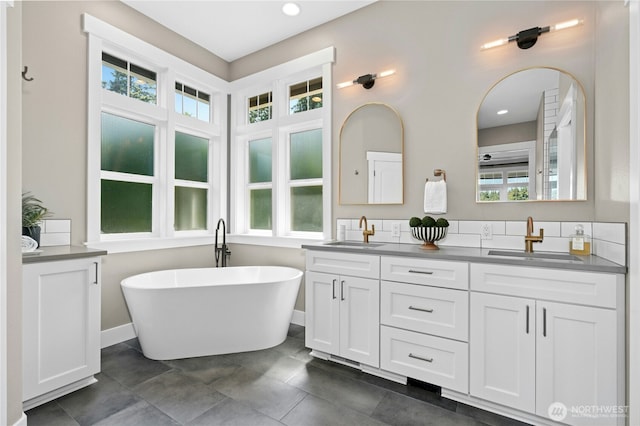 3844 Long Lake Loop SE, Olympia, WA 98503 - bathroom featuring double vanity and a freestanding bath