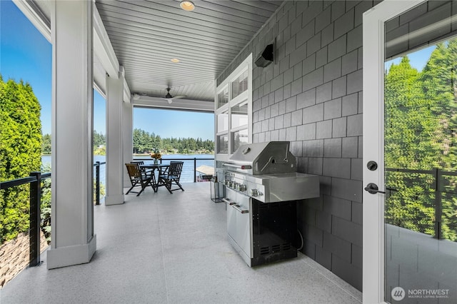 3844 Long Lake Loop SE, Olympia, WA 98503 - view of patio with ceiling fan, outdoor dining space, grilling area, and a water view