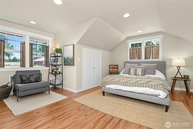 3844 Long Lake Loop SE, Olympia, WA 98503 - bedroom featuring light wood-style flooring, recessed lighting, and lofted ceiling