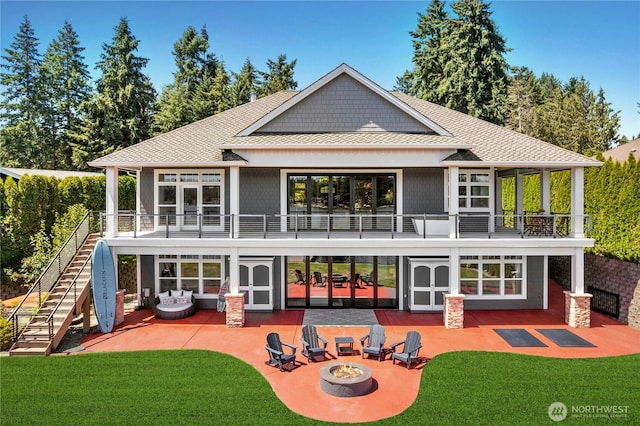 3844 Long Lake Loop SE, Olympia, WA 98503 - rear view of house with a patio area, an outdoor fire pit, stairway, and a lawn