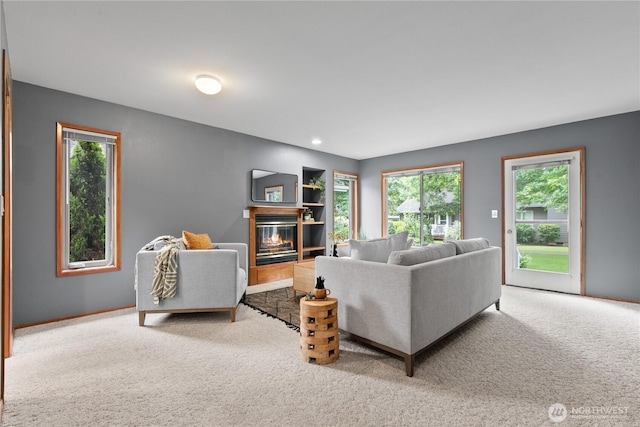 4867 N Village Ln, Bellingham, WA 98226 - carpeted living room featuring a glass covered fireplace, plenty of natural light, and recessed lighting