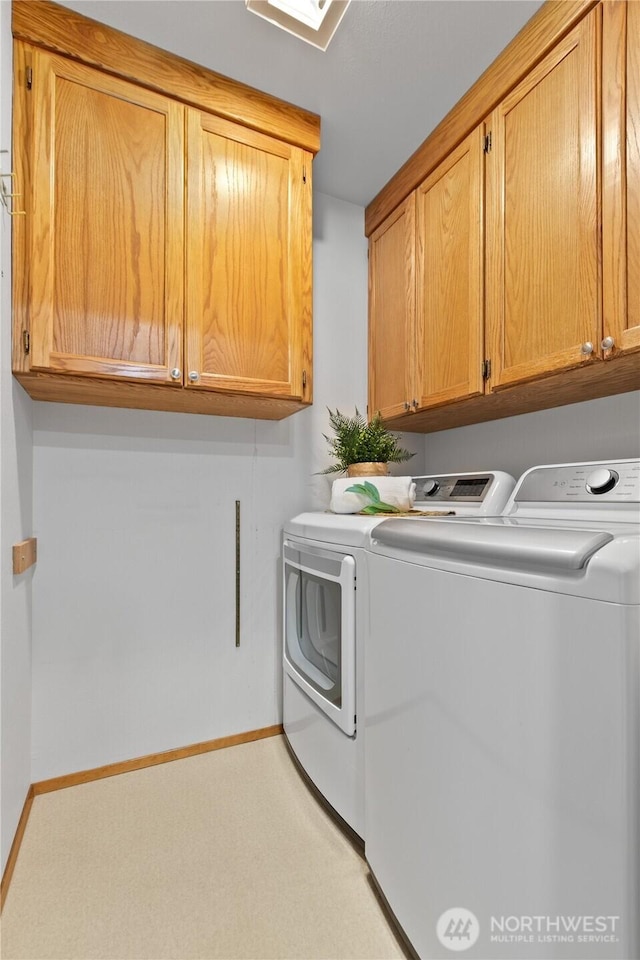 4867 N Village Ln, Bellingham, WA 98226 - laundry room with washing machine and dryer, cabinet space, and light carpet