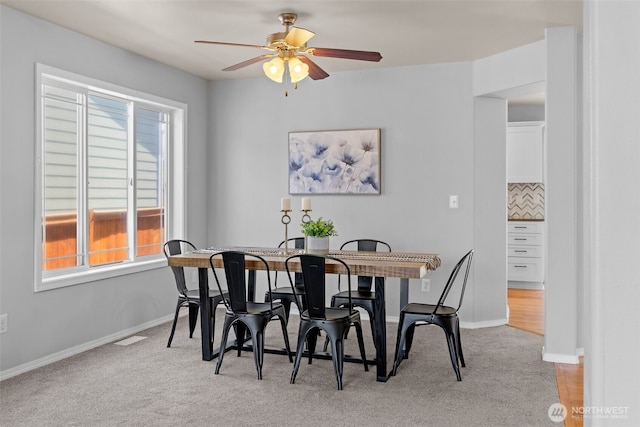 10873 SE 214th Pl, Kent, WA 98031 - dining space featuring healthy amount of natural light, carpet flooring, and ceiling fan