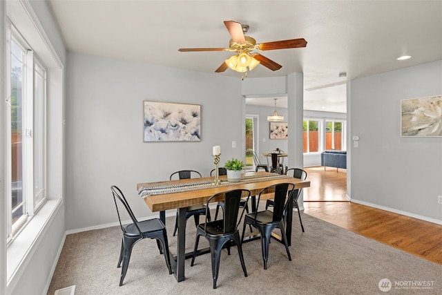 10873 SE 214th Pl, Kent, WA 98031 - carpeted dining space featuring ceiling fan and wood finished floors