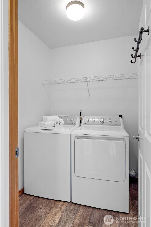 10873 SE 214th Pl, Kent, WA 98031 - laundry area with washer and dryer and wood finished floors