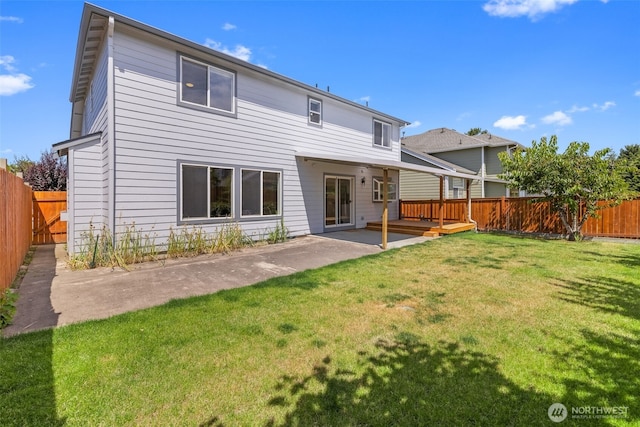 10873 SE 214th Pl, Kent, WA 98031 - back of house with a fenced backyard and a patio