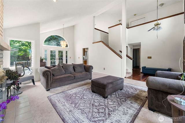 8113 S 121st St, Seattle, WA 98178 - carpeted living area with stairs and high vaulted ceiling