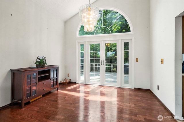 8113 S 121st St, Seattle, WA 98178 - doorway to outside featuring hardwood / wood-style flooring, a chandelier, a high ceiling, and french doors