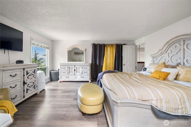 8113 S 121st St, Seattle, WA 98178 - bedroom with wood finished floors and a textured ceiling