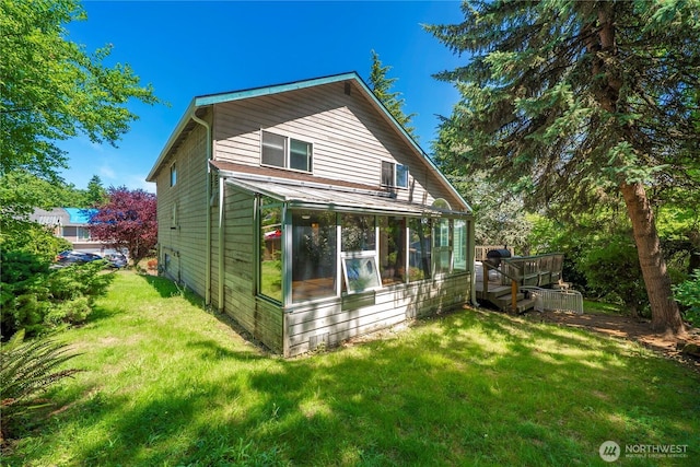 8113 S 121st St, Seattle, WA 98178 - view of side of property featuring a sunroom and a yard