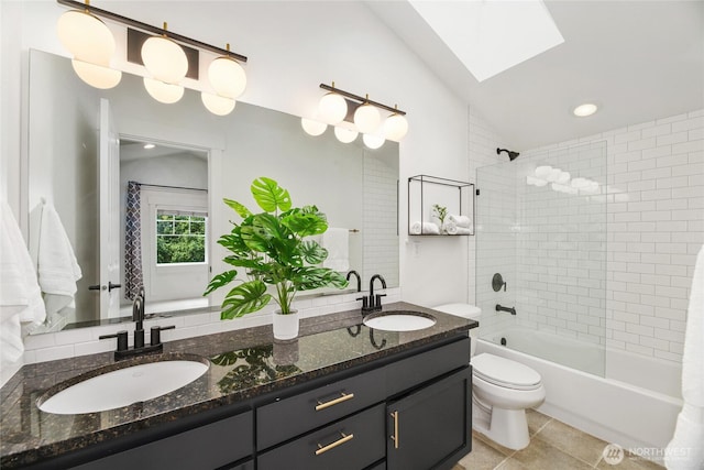 9217 Roosevelt Way NE Unit B, Seattle, WA 98115 - full bathroom with a skylight, double vanity, lofted ceiling, shower / bath combination, and tile patterned floors