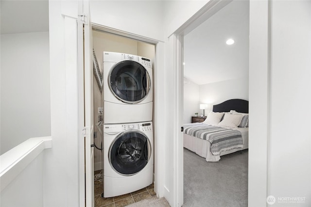 9217 Roosevelt Way NE Unit B, Seattle, WA 98115 - washroom with stacked washing machine and dryer, recessed lighting, and tile patterned flooring