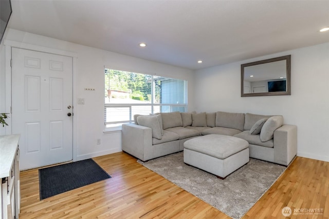 7718 50th Ave E, Tacoma, WA 98443 - living room featuring light wood-type flooring and recessed lighting