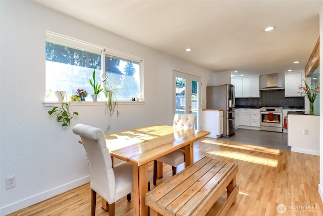 7718 50th Ave E, Tacoma, WA 98443 - dining area with light wood finished floors and recessed lighting
