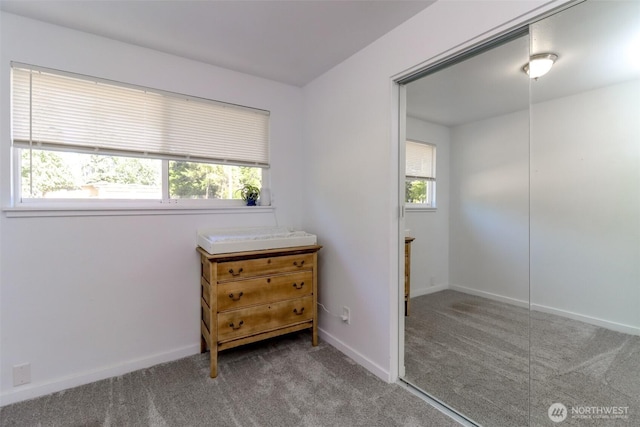 7718 50th Ave E, Tacoma, WA 98443 - bedroom featuring carpet floors and baseboards