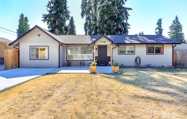 7718 50th Ave E, Tacoma, WA 98443 - ranch-style house featuring covered porch and roof with shingles