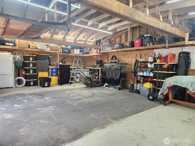 7718 50th Ave E, Tacoma, WA 98443 - garage featuring freestanding refrigerator