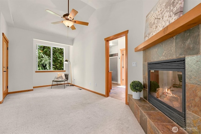 5 Arabian Way, Bellingham, WA 98229 - unfurnished living room featuring a tile fireplace, carpet floors, a ceiling fan, and high vaulted ceiling