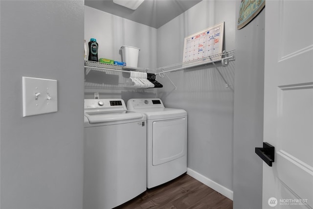 19826 207th Street Ct E, Orting, WA 98360 - laundry area featuring washer and dryer and dark wood-style flooring