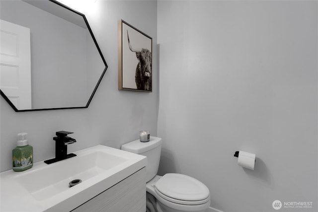 19826 207th Street Ct E, Orting, WA 98360 - half bathroom featuring toilet and vanity