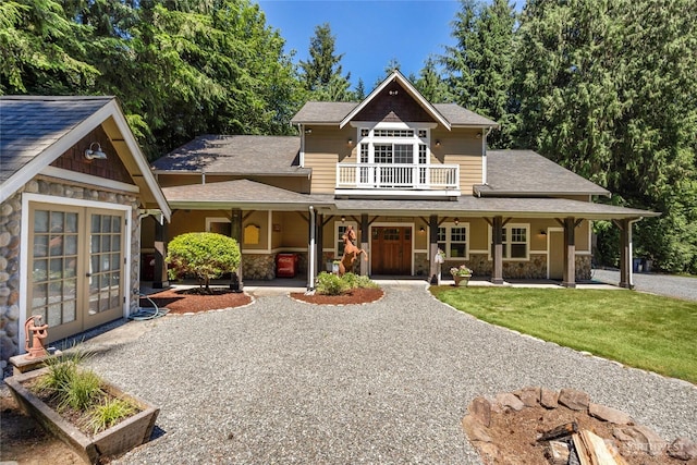 19808 Yew Way, Snohomish, WA 98296 - view of front of home with stone siding, a porch, and a front yard