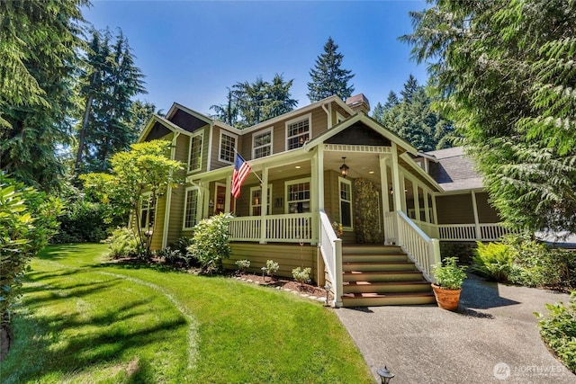 19808 Yew Way, Snohomish, WA 98296 - view of front facade featuring a chimney, a porch, and a front lawn