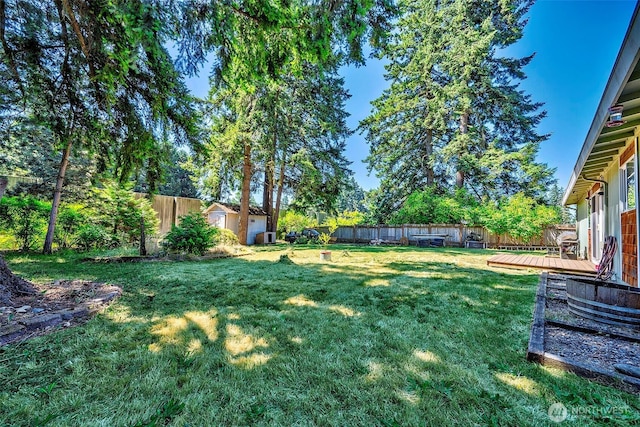 17141 SE 267th St, Covington, WA 98042 - fenced backyard with a shed and a deck