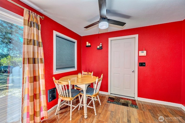 17141 SE 267th St, Covington, WA 98042 - dining area with wood finished floors, ceiling fan, and heating unit