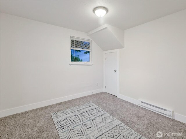 2118 S Sheridan Ave, Tacoma, WA 98405 - bonus room with carpet and a baseboard radiator