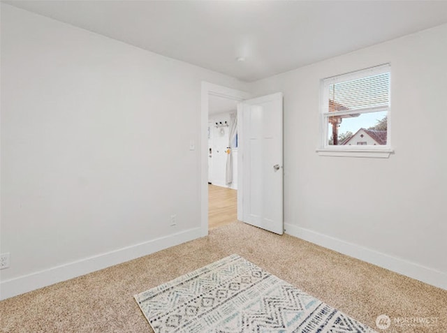 2118 S Sheridan Ave, Tacoma, WA 98405 - unfurnished bedroom with light colored carpet and baseboards
