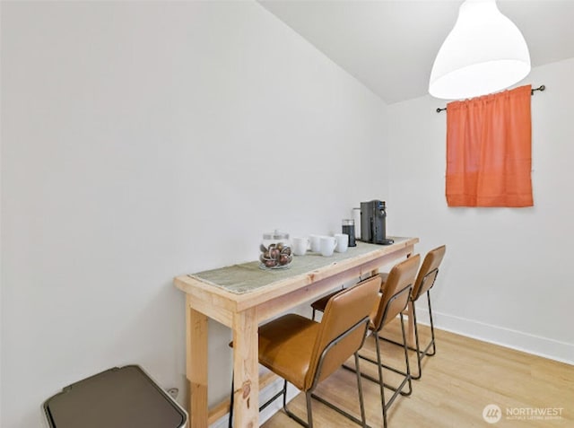 2118 S Sheridan Ave, Tacoma, WA 98405 - dining area featuring light wood-style floors and baseboards
