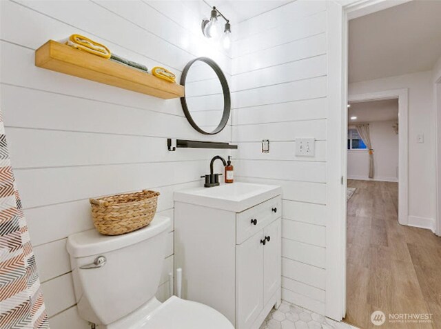 2118 S Sheridan Ave, Tacoma, WA 98405 - full bathroom featuring vanity and wood finished floors