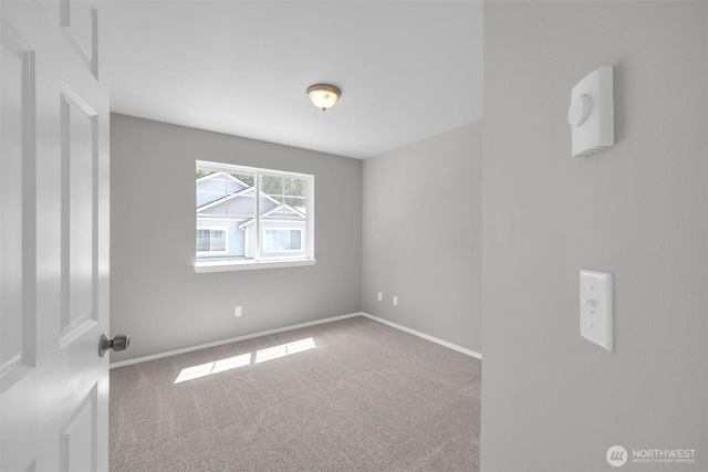 19168 110th Pl SE Unit 19168, Renton, WA 98055 - empty room with carpet floors and baseboards