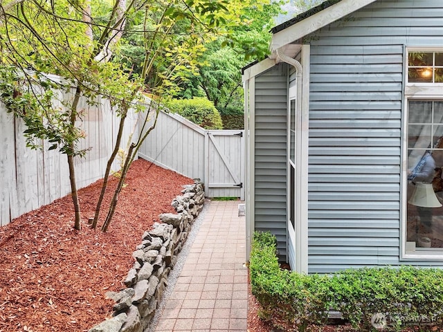 19168 110th Pl SE Unit 19168, Renton, WA 98055 - view of patio with a gate